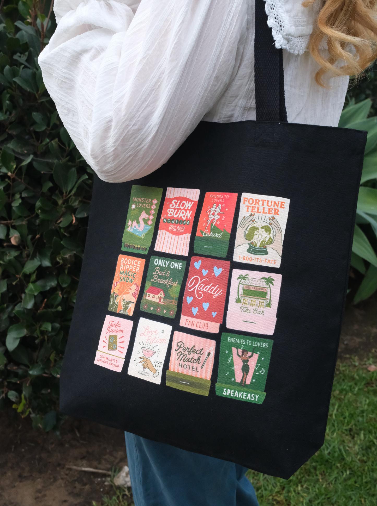 Burning Through Chapters Canvas Gusseted Tote Bag in Black