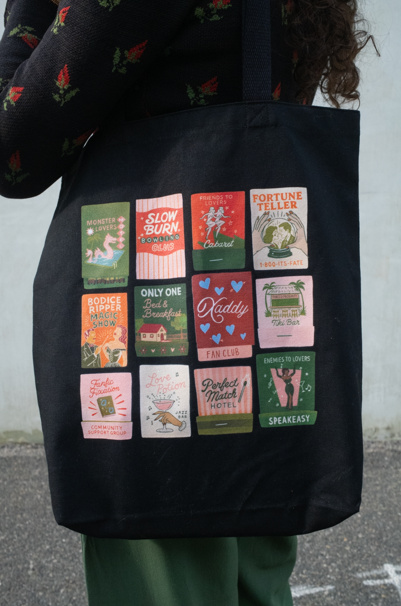 Burning Through Chapters Canvas Gusseted Tote Bag in Black