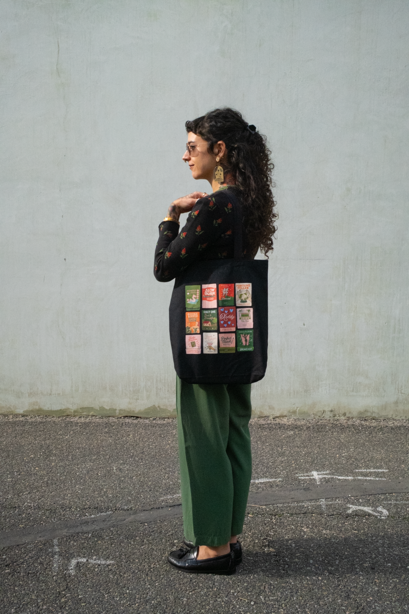 Burning Through Chapters Canvas Gusseted Tote Bag in Black